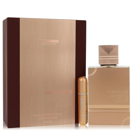 Al Haramain Amber Oud Gold Edition Extreme Gift Set By Al Haramain 6.7 Pure Perfume Spray + 0.34 oz Refillable Spray Gift Set - 6.7 Pure Perfume Spray + 0.34 Oz Refillable...